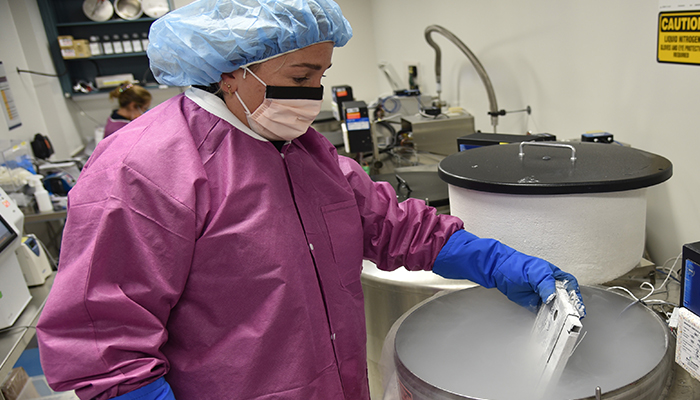 SLab supervisor, Rene Machietto, performs verification of cryo-preserved product from the CGTL’s liquid nitrogen tank. (Photo courtesy of Jason Roberts.)